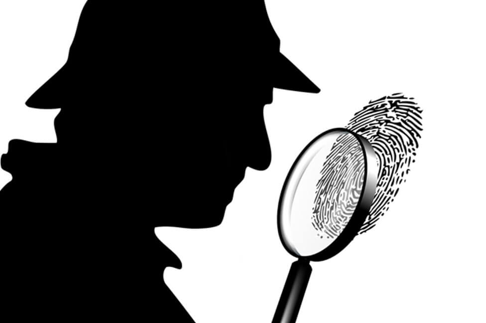 Inspecting Fingerprint With Magnifying Glass